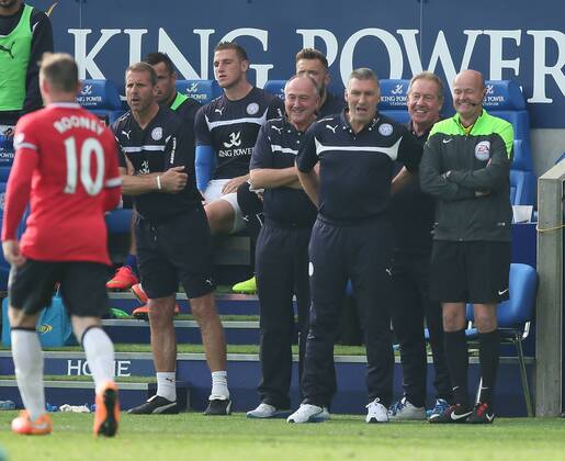 Nigel Pearson manager of Leicester City has a laugh with the fourth official minutes before the end of the match - Barclays Premier League - Leicester City vs Manchester Utd - King Power Stadium - Leicester - England - 21st September 2014 - Picture Simon Bellis Sportimage EDITORIAL USE ONLY. No use with unauthorised audio, video, data, fixture lists, club league logos or live services. Online in-match use limited to 120 images, no video emulation. No use in betting, games or single club league player publications.