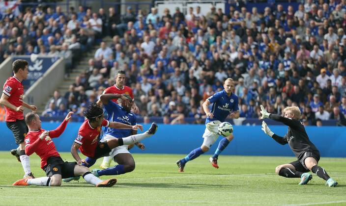 Radamel Falcao of Manchester United shot is saved by Kasper Schmeichel of Leicester City - Barclays Premier League - Leicester City vs Manchester Utd - King Power Stadium - Leicester - England - 21st September 2014 - Picture Simon Bellis Sportimage EDITORIAL USE ONLY. No use with unauthorised audio, video, data, fixture lists, club league logos or live services. Online in-match use limited to 120 images, no video emulation. No use in betting, games or single club league player publications.