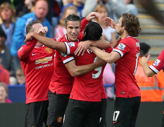 Robin van Persie of Manchester United celebrates scoring the first goal - Barclays Premier League - Leicester City vs Manchester Utd - King Power Stadium - Leicester - England - 21st September 2014 - Picture Simon Bellis Sportimage EDITORIAL USE ONLY. No use with unauthorised audio, video, data, fixture lists, club league logos or live services. Online in-match use limited to 120 images, no video emulation. No use in betting, games or single club league player publications.