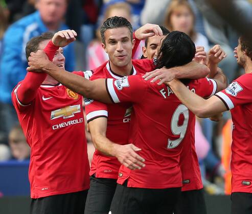 Robin van Persie of Manchester United celebrates scoring the first goal - Barclays Premier League - Leicester City vs Manchester Utd - King Power Stadium - Leicester - England - 21st September 2014 - Picture Simon Bellis Sportimage EDITORIAL USE ONLY. No use with unauthorised audio, video, data, fixture lists, club league logos or live services. Online in-match use limited to 120 images, no video emulation. No use in betting, games or single club league player publications.