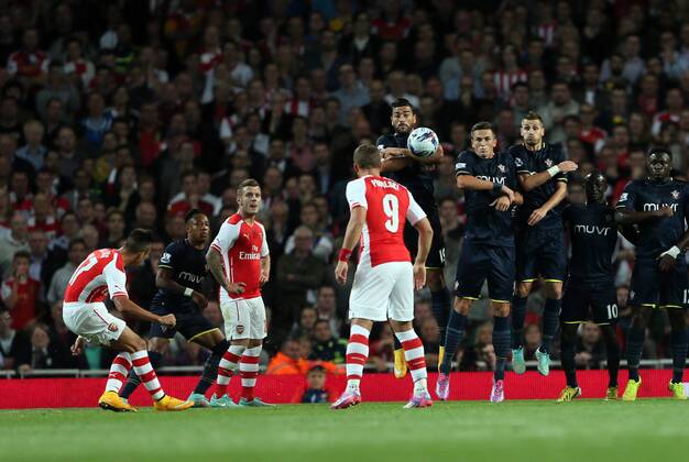 Arsenal s Alexis Sanchez scoring his sides opening goal - Capital One Cup - Arsenal FC London vs FC Southampton EDITORIAL USE ONLY. No use with unauthorised audio, video, data, fixture lists, club league logos or live services. Online in-match use limited to 120 images, no video emulation. No use in betting, games or single club league player publications.