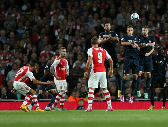 Arsenal s Alexis Sanchez scoring his sides opening goal - Capital One Cup - Arsenal FC London vs FC Southampton EDITORIAL USE ONLY. No use with unauthorised audio, video, data, fixture lists, club league logos or live services. Online in-match use limited to 120 images, no video emulation. No use in betting, games or single club league player publications.