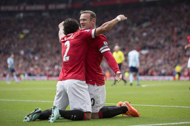 Wayne Rooney of Manchester United celebrates his opening goal - Manchester United vs. West Ham United - Barclay s Premier League - Old Trafford - Manchester - 27 09 2014 Pic Philip Oldham Sportimage EDITORIAL USE ONLY. No use with unauthorised audio, video, data, fixture lists, club league logos or live services. Online in-match use limited to 120 images, no video emulation. No use in betting, games or single club league player publications.