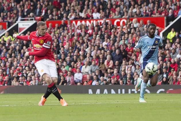Wayne Rooney of Manchester United strikes at goal - Manchester United vs. West Ham United - Barclay s Premier League - Old Trafford - Manchester - 27 09 2014 Pic Philip Oldham Sportimage EDITORIAL USE ONLY. No use with unauthorised audio, video, data, fixture lists, club league logos or live services. Online in-match use limited to 120 images, no video emulation. No use in betting, games or single club league player publications.