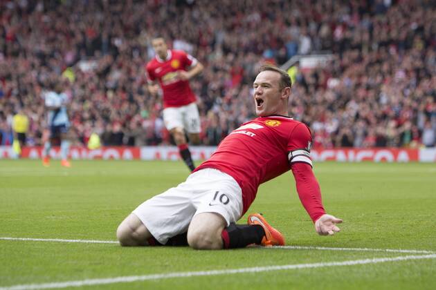 Wayne Rooney of Manchester United celebrates his opening goal - Manchester United vs. West Ham United - Barclay s Premier League - Old Trafford - Manchester - 27 09 2014 Pic Philip Oldham Sportimage EDITORIAL USE ONLY. No use with unauthorised audio, video, data, fixture lists, club league logos or live services. Online in-match use limited to 120 images, no video emulation. No use in betting, games or single club league player publications.