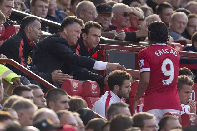 Louis Van Gaal, manager of Manchester United thanks Falcao - Manchester United vs. West Ham United - Barclay s Premier League - Old Trafford - Manchester - 27 09 2014 Pic Philip Oldham Sportimage EDITORIAL USE ONLY. No use with unauthorised audio, video, data, fixture lists, club league logos or live services. Online in-match use limited to 120 images, no video emulation. No use in betting, games or single club league player publications.