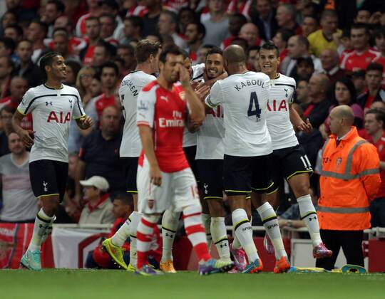 Arsenal FC London - Tottenham Hotspur Nacer Chadli (TH) celebrates scoring a goal for Tottenham as Santi Cazorla (A) is dejected. 0-1