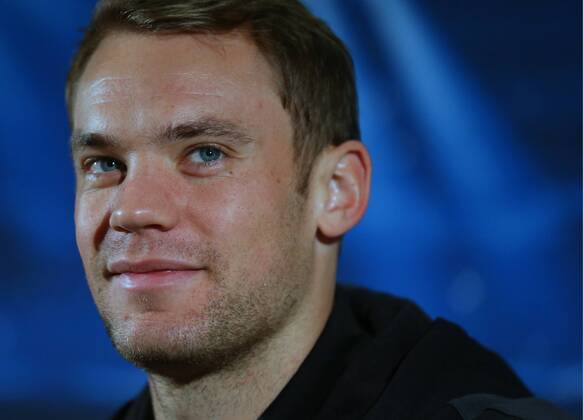 ITAR-TASS: MOSCOW REGION, RUSSIA. SEPTEMBER 29, 2014. FC Bayern Munich goalkeeper Manuel Neuer reacts during a press conference ahead of a UEFA Champions League Group E football match.  RE1507E6