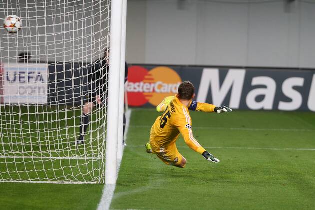 ITAR-TASS: MOSCOW REGION, RUSSIA. SEPTEMBER 30, 2014. CSKA s goalkeeper Igor Akindeev concedes a goal in a 2014 15 Season UEFA Champions League Group E football match against Bayern Munich at Arena Khimki Stadium.  RE1509D7