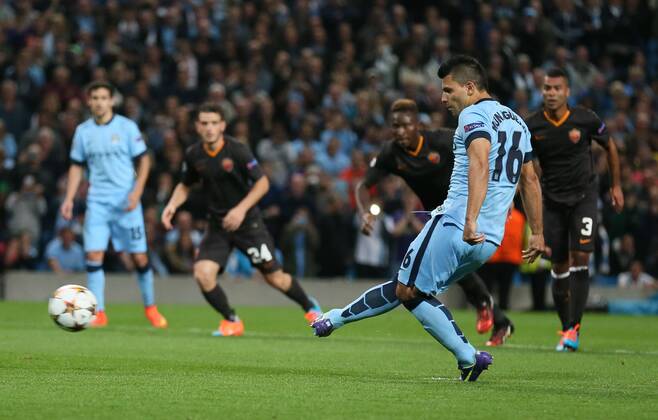 Sergio Aguero of Manchester City scores from the penalty spot - UEFA Champions League group E - Manchester City vs Roma - Etihad Stadium - Manchester - England - 30th September 2014 - Picture Simon Bellis Sportimage EDITORIAL USE ONLY. No use with unauthorised audio, video, data, fixture lists, club league logos or live services. Online in-match use limited to 120 images, no video emulation. No use in betting, games or single club league player publications.