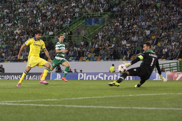 Diego Costa of Chelsea goes through on goal but sees his shot saved by Sporting s Rui Patricio - Sporting Lisbon vs. Chelsea - UEFA Champions League - Estadio Jose Alvalade - Lisbon - 30 09 2014 Pic Philip Oldham Sportimage EDITORIAL USE ONLY. No use with unauthorised audio, video, data, fixture lists, club league logos or live services. Online in-match use limited to 120 images, no video emulation. No use in betting, games or single club league player publications.