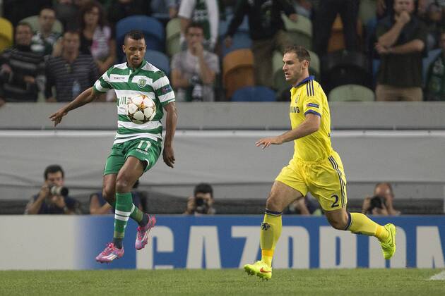 Sporting s Nani and Branislav Ivanovic of Chelsea in action - Sporting Lisbon vs. Chelsea - UEFA Champions League - Estadio Jose Alvalade - Lisbon - 30 09 2014 Pic Philip Oldham Sportimage EDITORIAL USE ONLY. No use with unauthorised audio, video, data, fixture lists, club league logos or live services. Online in-match use limited to 120 images, no video emulation. No use in betting, games or single club league player publications.
