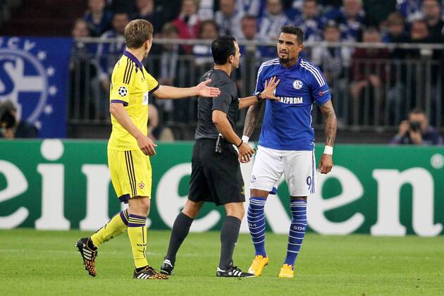 vl: Ales Mertelj (NK Maribor 70), Referee Carlos Velasco Carballo (Spain), Kevin-Prince Boateng (FC Schalke 04 9) FC Schalke 04 vs NK Maribor--- Fussball --- Champions-League --- Gruppenphase --- 2. Spieltag --- 30.09.2014, EP_JSE