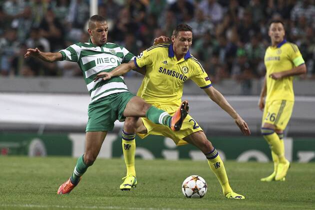 Sporting s forward Islam Slimani (L) vies with Chelsea s midfielder, Nemanja Matic (R) during a soccer match between Portugal s Sporting CP and England s Chelsea FC for the group stage of the UEFA Champions League, in Sporting s Alvalade Stadium in Lisbon, Portugal, on September 30, 2014. Photo by Pedro Nunes Portugal: UEFA Champions League: Sporting Vs Chelsea 