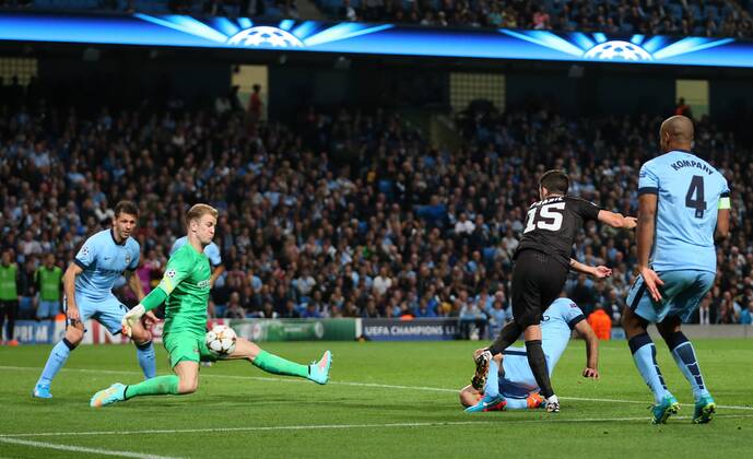 Joe Hart of Manchester City saves point blank from Miralem Pjanic of Roma - UEFA Champions League group E - Manchester City vs Roma - Etihad Stadium - Manchester - England - 30th September 2014 - Picture Simon Bellis Sportimage EDITORIAL USE ONLY. No use with unauthorised audio, video, data, fixture lists, club league logos or live services. Online in-match use limited to 120 images, no video emulation. No use in betting, games or single club league player publications.