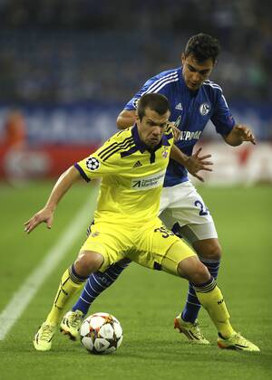 Foto : Kaan Ayhan Schalke gegen Damjan Bohar Fussball Champions League am Di. 30.09.2014 Spieltag 2 Schalke 04 - NK Maribor