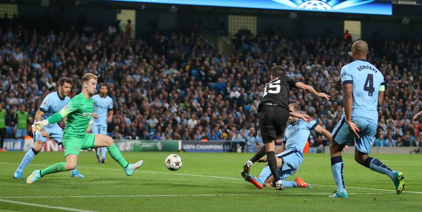 Joe Hart of Manchester City makes a save from a shot by Miralem Pjanic of Roma - UEFA Champions League group E - Manchester City vs Roma - Etihad Stadium - Manchester - England - 30th September 2014 - Picture Simon Bellis Sportimage EDITORIAL USE ONLY. No use with unauthorised audio, video, data, fixture lists, club league logos or live services. Online in-match use limited to 120 images, no video emulation. No use in betting, games or single club league player publications.