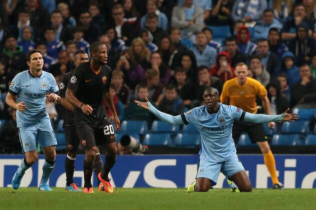 Yaya Toure of Manchester City appeals for a penalty - UEFA Champions League group E - Manchester City vs Roma - Etihad Stadium - Manchester - England - 30th September 2014 - Picture Simon Bellis Sportimage EDITORIAL USE ONLY. No use with unauthorised audio, video, data, fixture lists, club league logos or live services. Online in-match use limited to 120 images, no video emulation. No use in betting, games or single club league player publications.
