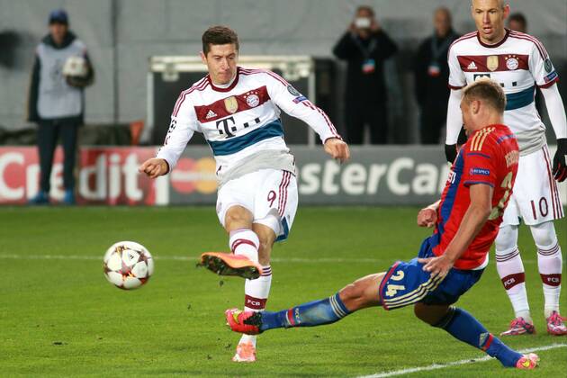 September 30, 2014. Russia, Khimki, arena New Khimki. CSKA s player Vasili Berezutski and Bayern s player Robert Lewandowski in the 2014 15 UEFA Champions League s group stage match between CSKA (Moscow, Russia) and FC Bayern Munich (Munich, Germany) DmitryxGolubovich 