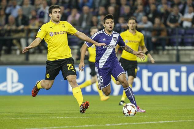 - BRUSSELS, BELGIUM: Dortmund s Sokratis Papastathopoulos and Anderlecht s Alexandar Mitrovic fight for the ball during a UEFA Champions League game between Belgian team RSC Anderlecht and German Borussia Dortmund, in Brussels, in the Constant Vanden Stock stadium, on the second day of the group stage competition, in the in group D, Wednesday 01 October 2014. THIERRYxROGE  premiumd 20470488