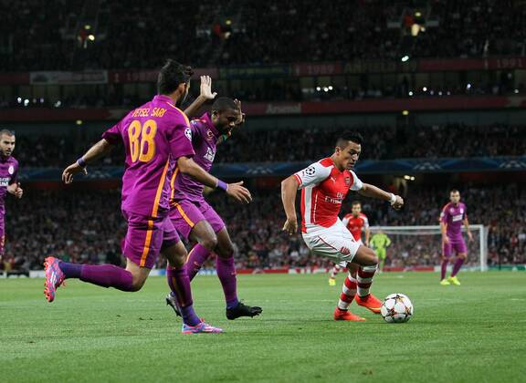 Arsenal s Alexis Sanchez in action - UEFA Champions League Group D - Arsenal vs Galatasaray - Emirates Stadium - England - 01st October 2014 - Picture David Klein Sportimage EDITORIAL USE ONLY. No use with unauthorised audio, video, data, fixture lists, club league logos or live services. Online in-match use limited to 120 images, no video emulation. No use in betting, games or single club league player publications.