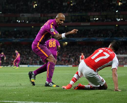 Arsenal s Alexis Sanchez gets accused of diving by Galatasaray s Felipe Melo - UEFA Champions League Group D - Arsenal vs Galatasaray - Emirates Stadium - England - 01st October 2014 - Picture David Klein Sportimage EDITORIAL USE ONLY. No use with unauthorised audio, video, data, fixture lists, club league logos or live services. Online in-match use limited to 120 images, no video emulation. No use in betting, games or single club league player publications.