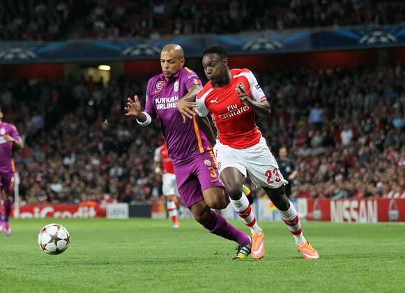 Arsenal s Danny Welbeck tussles with Galatasaray s Felipe Melo - UEFA Champions League Group D - Arsenal vs Galatasaray - Emirates Stadium - England - 01st October 2014 - Picture David Klein Sportimage EDITORIAL USE ONLY. No use with unauthorised audio, video, data, fixture lists, club league logos or live services. Online in-match use limited to 120 images, no video emulation. No use in betting, games or single club league player publications.