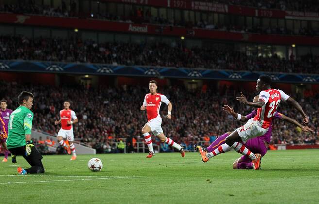 Arsenal s Danny Welbeck scoring his sides opening goal - UEFA Champions League Group D - Arsenal vs Galatasaray - Emirates Stadium - England - 01st October 2014 - Picture David Klein Sportimage EDITORIAL USE ONLY. No use with unauthorised audio, video, data, fixture lists, club league logos or live services. Online in-match use limited to 120 images, no video emulation. No use in betting, games or single club league player publications.