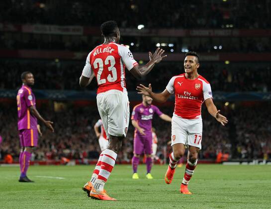 Arsenal s Danny Welbeck celebrates scoring his sides opening goal with Alexis Sanchez - UEFA Champions League Group D - Arsenal vs Galatasaray - Emirates Stadium - England - 01st October 2014 - Picture David Klein Sportimage EDITORIAL USE ONLY. No use with unauthorised audio, video, data, fixture lists, club league logos or live services. Online in-match use limited to 120 images, no video emulation. No use in betting, games or single club league player publications.