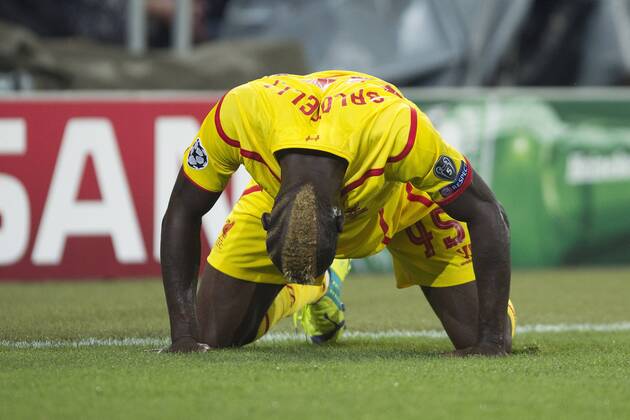 Mario Balotelli of Liverpool looks dejected - FC Basel vs. Liverpool - UEFA Champions League - St Jakobs Park - Basel - 01 10 2014 Pic Philip Oldham Sportimage EDITORIAL USE ONLY. No use with unauthorised audio, video, data, fixture lists, club league logos or live services. Online in-match use limited to 120 images, no video emulation. No use in betting, games or single club league player publications.
