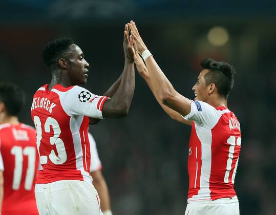 Arsenal s Alexis Sanchez celebrates scoring his sides third goal with Danny Welbeck - UEFA Champions League Group D - Arsenal vs Galatasaray - Emirates Stadium - England - 01st October 2014 - Picture David Klein Sportimage EDITORIAL USE ONLY. No use with unauthorised audio, video, data, fixture lists, club league logos or live services. Online in-match use limited to 120 images, no video emulation. No use in betting, games or single club league player publications.