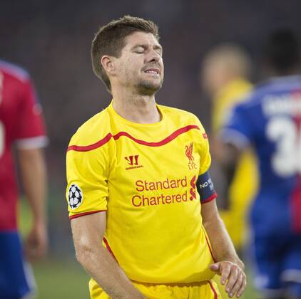 Steven Gerrard of Liverpool looks dejected following the opening goal - FC Basel vs. Liverpool - UEFA Champions League - St Jakobs Park - Basel - 01 10 2014 Pic Philip Oldham Sportimage EDITORIAL USE ONLY. No use with unauthorised audio, video, data, fixture lists, club league logos or live services. Online in-match use limited to 120 images, no video emulation. No use in betting, games or single club league player publications.