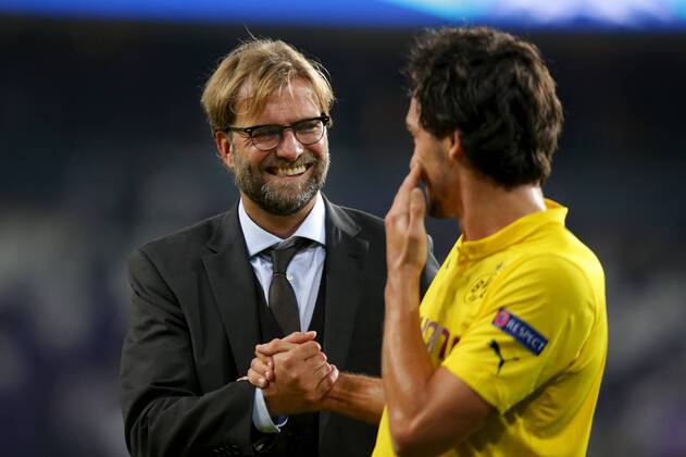 01.10.2014, xgsx, Fussball Champions League, RSC Anderlecht - Borussia Dortmund, v.l. Jürgen Klopp (Jürgen - Trainer Borussia Dortmund (BVB)) und Mats Hummels (Borussia Dortmund (BVB) - 15) jubeln nach dem Spiel - Shakehands