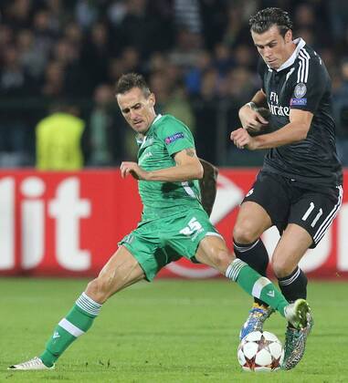 01.10.2014 Sofia(Bulgaria) PFC Ludogorets-CF Real Madrid Champions League men s football Gareth Bale(r) CF Real Madrid and Yordan Minev(L) PFC Ludogorets :Stringer 