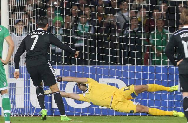 01.10.2014 Sofia(Bulgaria) PFC Ludogorets-CF Real Madrid Champions League men s football Cristiano Ronaldo(L) CF Real Madrid shoot penalty to Vladislav Stoyanov(r) PFC Ludogorets goalkeeper :Stringer 