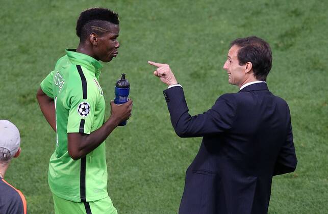 Juventus coach Massimiliano Allegri with his player Paul Pogba during Champions League 2014 2015 match.October 1,2014.  (20229582)