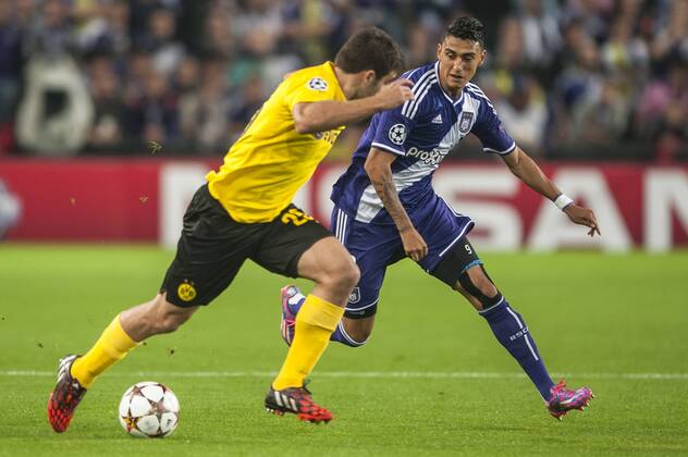 Brussels , Belgium October , 01 2014 Football UEFA Champions League 2014 2015 Constant Vanden Stock Stadium Group D RSC Anderlecht Borussia Dortmund On this picture : Sokratis Papastthopoulos Matias Suarez MichelxGouverneur 