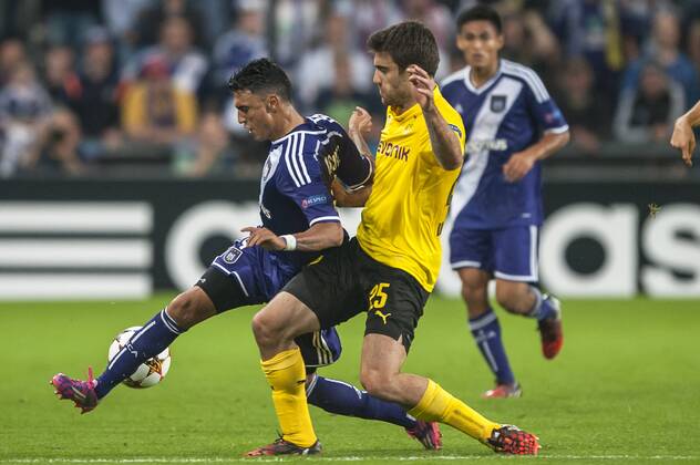Brussels , Belgium October , 01 2014 Football UEFA Champions League 2014 2015 Constant Vanden Stock Stadium Group D RSC Anderlecht Borussia Dortmund On this picture : Matias Suarez Sokratis Papastathopoulos MichelxGouverneur 