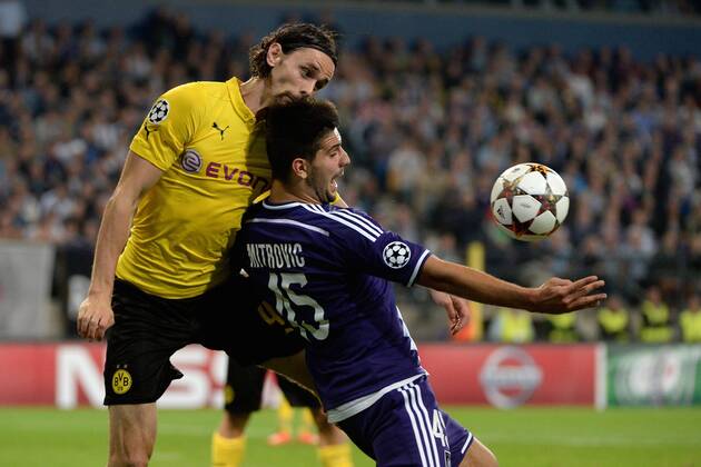 Neven Subotic of Borussia Dortmund and Alexandar Mitrovic of RSC Anderlecht FOOTBALL : Anderlecht vs Dortmund - Ligue des Champions - Bruxelles - 01 10 2014 PhotoNews Panoramic 