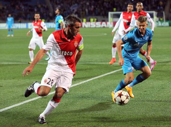 ST PETERSBURG, RUSSIA. OCTOBER 1, 2014. Monacoâ€™s Jeremy Toulalan and Zenitâ€™s Oleg Shatov (R) run for the ball during their UEFA Champions League Round 2 Group C football match at Petrovsky Stadium. The game ended in a 0-0 draw. RuslanxShamukov TASS  RE150B92