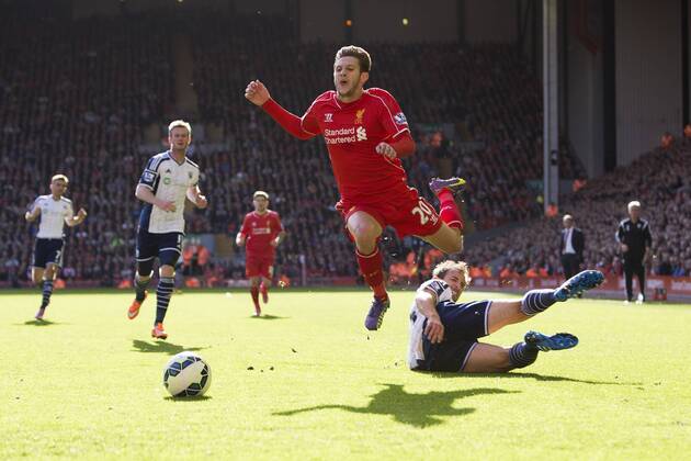 West Brom s Craig Dawson tackles Adam Lallana of Liverpool - FC Liverpool vs. West Bromwich Albion - Barclay s Premier League - Anfield - Liverpool - 04 10 2014 EDITORIAL USE ONLY. No use with unauthorised audio, video, data, fixture lists, club league logos or live services. Online in-match use limited to 120 images, no video emulation. No use in betting, games or single club league player publications.