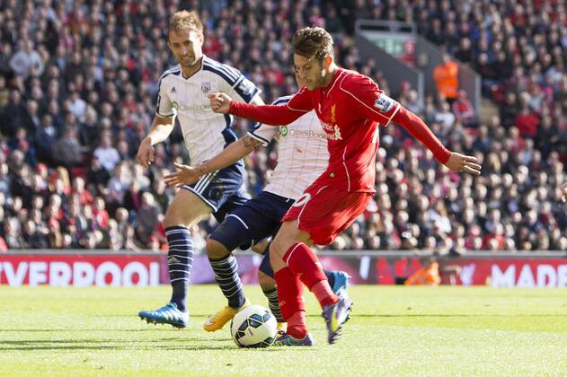 Adam Lallana of Liverpool scores the opening goal - FC Liverpool vs. West Bromwich Albion - Barclay s Premier League - Anfield - Liverpool - 04 10 2014 EDITORIAL USE ONLY. No use with unauthorised audio, video, data, fixture lists, club league logos or live services. Online in-match use limited to 120 images, no video emulation. No use in betting, games or single club league player publications.