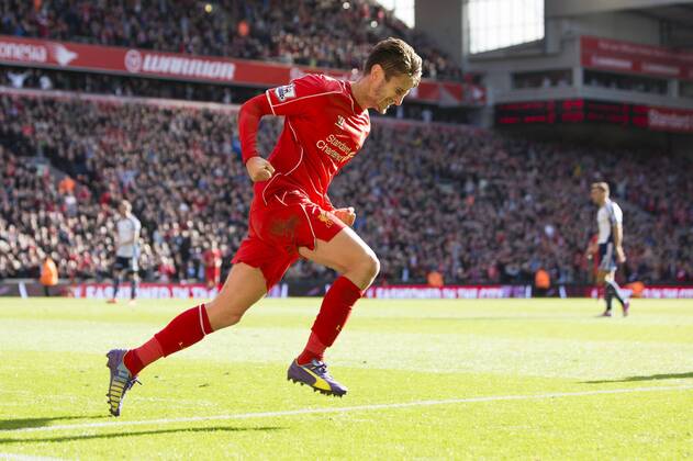 Adam Lallana of Liverpool celebrates his opening goal - FC Liverpool vs. West Bromwich Albion - Barclay s Premier League - Anfield - Liverpool - 04 10 2014 EDITORIAL USE ONLY. No use with unauthorised audio, video, data, fixture lists, club league logos or live services. Online in-match use limited to 120 images, no video emulation. No use in betting, games or single club league player publications.