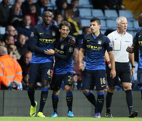 Yaya Toure of Manchester City (l) celebrates scoring the first goal - Barclays Premier League - Aston Villa vs Manchester City - - England - 4th October 2014 - Picture SimonxBellis Sportimage EDITORIAL USE ONLY. No use with unauthorised audio, video, data, fixture lists, club league logos or live services. Online in-match use limited to 120 images, no video emulation. No use in betting, games or single club league player publications.