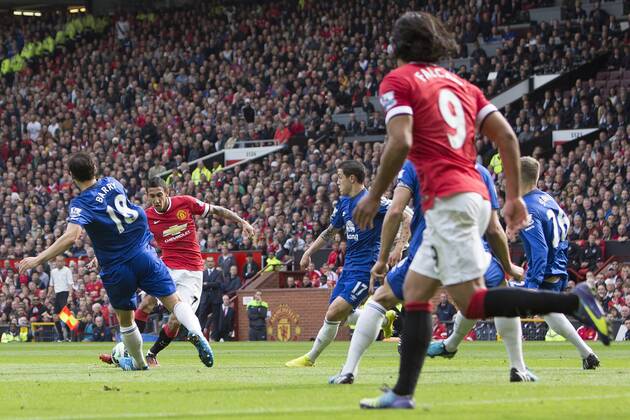 Angel di Maria of Manchester United scores the opening goal - Manchester United vs. Everton - Barclay s Premier League - Old Trafford - Manchester - 04 10 2014 Pic Philip Oldham Sportimage EDITORIAL USE ONLY. No use with unauthorised audio, video, data, fixture lists, club league logos or live services. Online in-match use limited to 120 images, no video emulation. No use in betting, games or single club league player publications.