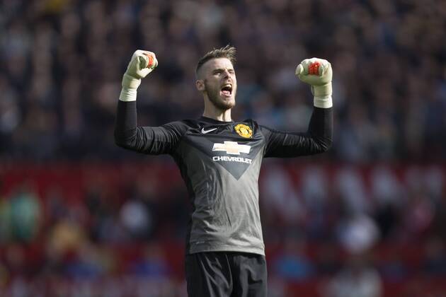 David de Gea of Manchester United celebrates as his side take a 2-1 lead - Manchester United vs. Everton - Barclay s Premier League - Old Trafford - Manchester - 04 10 2014 Pic Philip Oldham Sportimage EDITORIAL USE ONLY. No use with unauthorised audio, video, data, fixture lists, club league logos or live services. Online in-match use limited to 120 images, no video emulation. No use in betting, games or single club league player publications.