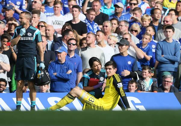 Chelsea s Thibaut Courtois goes off injured - Barclays Premier League - Chelsea Vs Arsenal - Stamford Bridge - England - 5th October 2014 - EDITORIAL USE ONLY. No use with unauthorised audio, video, data, fixture lists, club league logos or live services. Online in-match use limited to 120 images, no video emulation. No use in betting, games or single club league player publications.