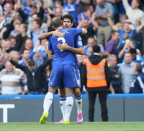 Chelsea s Diego Costa celebrates scoring his sides second goal - Barclays Premier League - Chelsea Vs Arsenal - Stamford Bridge - England - 5th October 2014 - EDITORIAL USE ONLY. No use with unauthorised audio, video, data, fixture lists, club league logos or live services. Online in-match use limited to 120 images, no video emulation. No use in betting, games or single club league player publications.