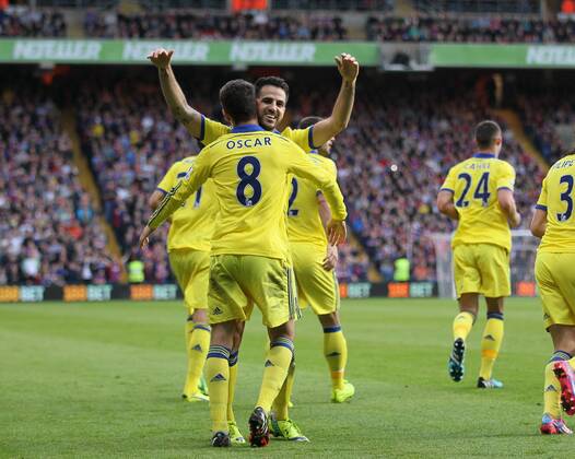 Chelsea s Cesc Fabregas celebrates scoring his sides second goal with Oscar - Barclays Premier League - Crystal Palace vs Chelsea - Selhurst Park - England - 18th October 2014 - Picture David Klein Sportimage EDITORIAL USE ONLY. No use with unauthorised audio, video, data, fixture lists, club league logos or live services. Online in-match use limited to 120 images, no video emulation. No use in betting, games or single club league player publications.