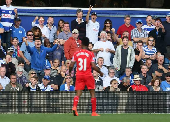 Liverpool s Raheem Sterling celebrates his sides opening goal to the QPR fans - Barclays Premier League - QPR vs Liverpool - Loftus Road - England - 19th October 2014 - Picture David Klein Sportimage EDITORIAL USE ONLY. No use with unauthorised audio, video, data, fixture lists, club league logos or live services. Online in-match use limited to 120 images, no video emulation. No use in betting, games or single club league player publications.